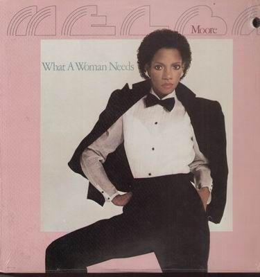 Album cover art for What a Woman Needs